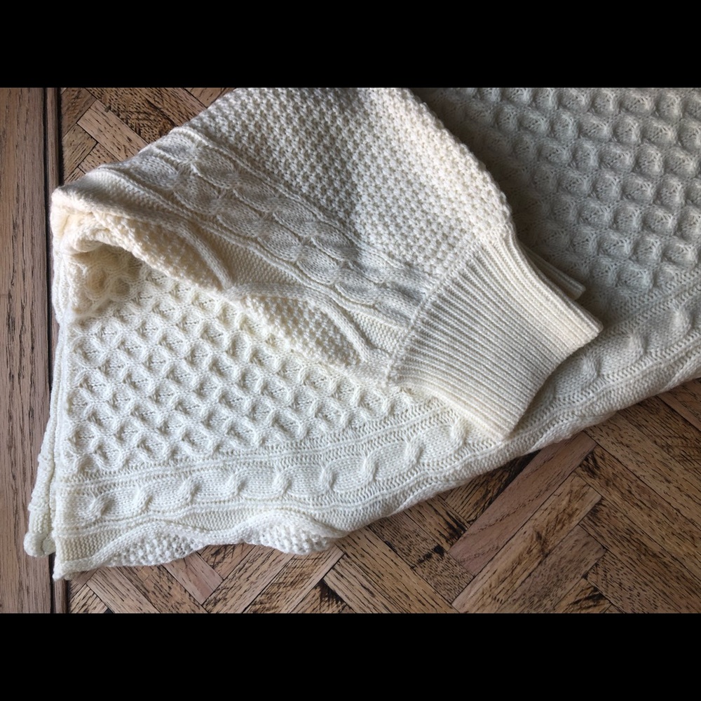 New!  This sweater is v neck & v back and v at the bottom.